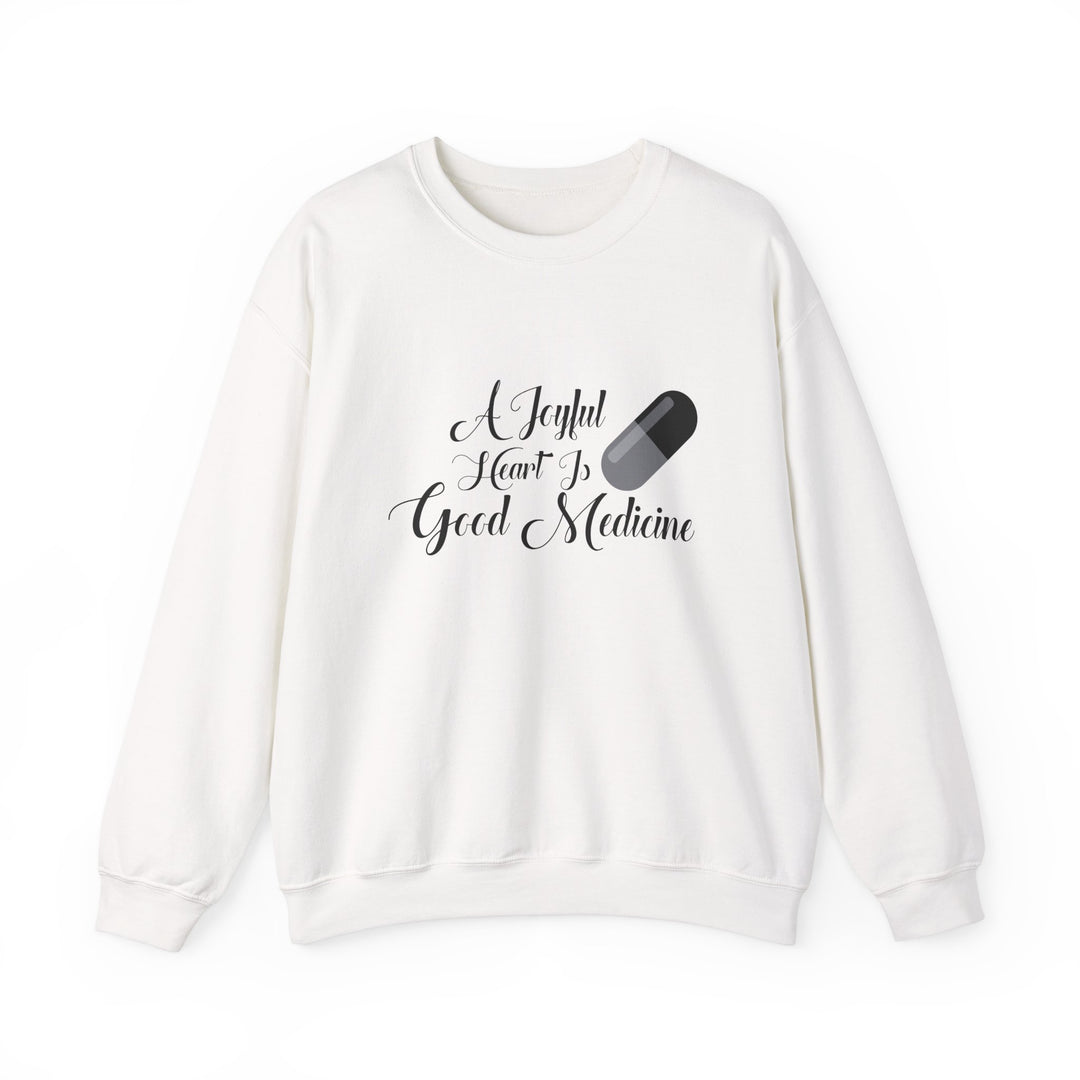 A Joyful Heart Is Good Medicine Unisex Heavy Blend™ Crewneck Sweatshirt