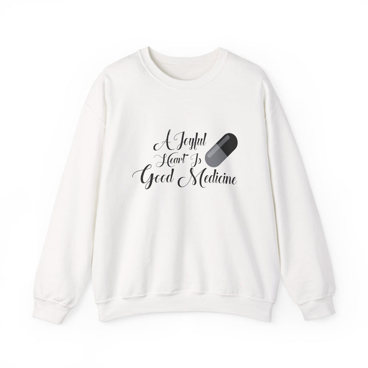 A Joyful Heart Is Good Medicine Unisex Heavy Blend™ Crewneck Sweatshirt