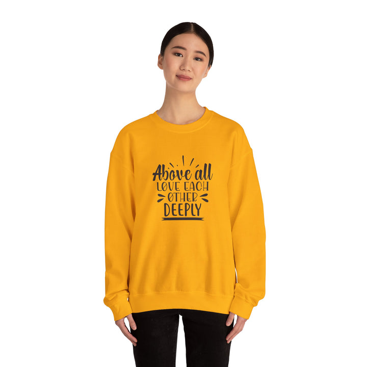 Above All Love Each Other Deeply Unisex Heavy Blend™ Crewneck Sweatshirt