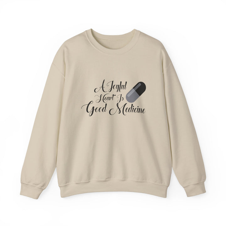 A Joyful Heart Is Good Medicine Unisex Heavy Blend™ Crewneck Sweatshirt