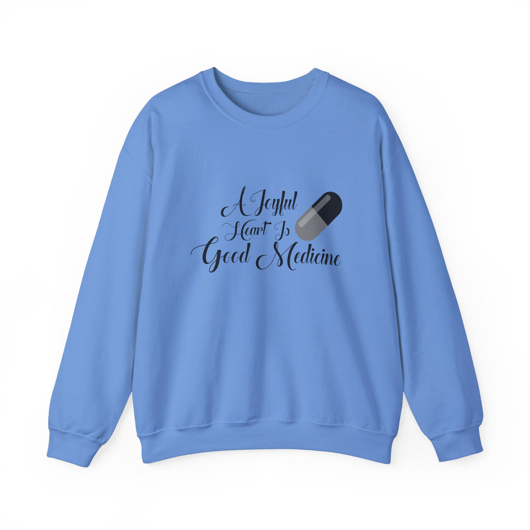 A Joyful Heart Is Good Medicine Unisex Heavy Blend™ Crewneck Sweatshirt