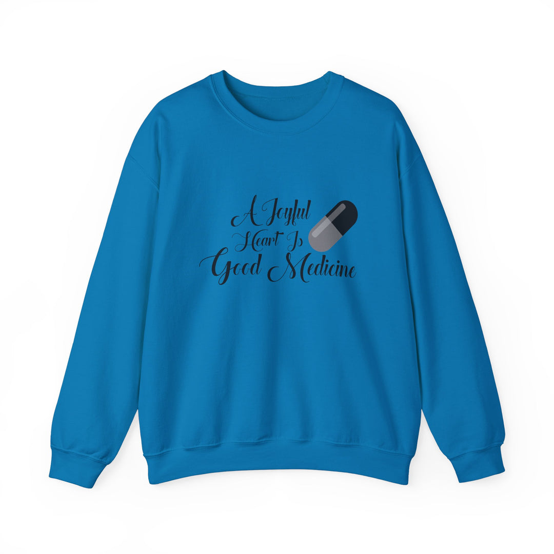 A Joyful Heart Is Good Medicine Unisex Heavy Blend™ Crewneck Sweatshirt