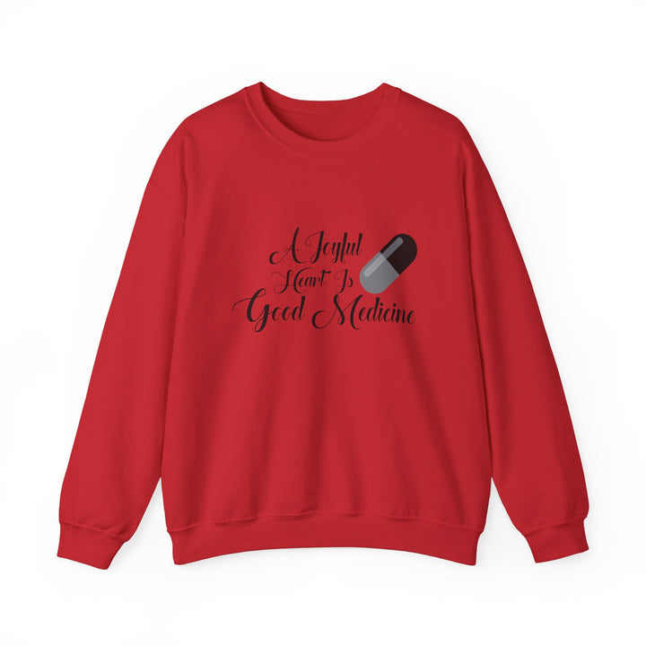 A Joyful Heart Is Good Medicine Unisex Heavy Blend™ Crewneck Sweatshirt