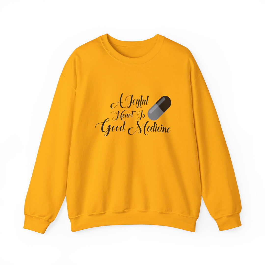 A Joyful Heart Is Good Medicine Unisex Heavy Blend™ Crewneck Sweatshirt