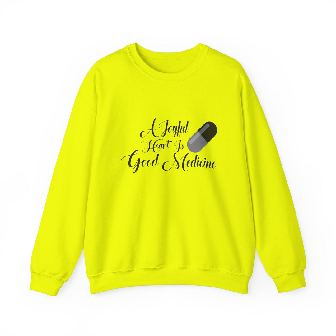 A Joyful Heart Is Good Medicine Unisex Heavy Blend™ Crewneck Sweatshirt - Faith Scripture Gift | Gifts Of Words