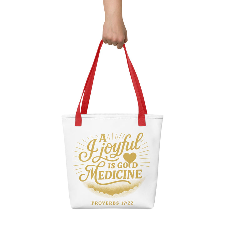 A joyful is a good medicine T-shirt Tote bag - Faith Scripture Gift | Gifts Of Words